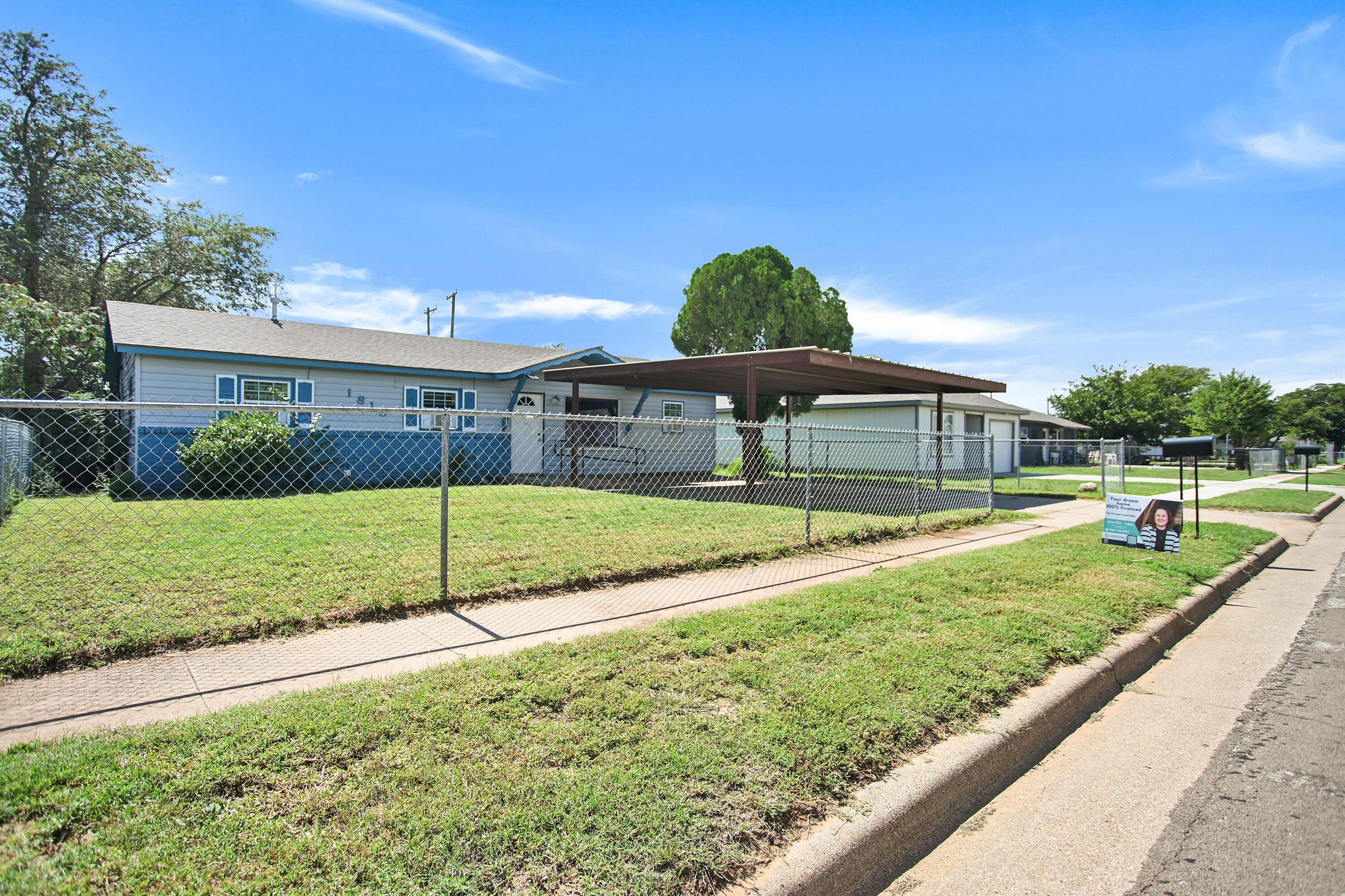 1810 East Colgate Street Lubbock, TX 79403 - Photo 3 of 40 a view of a house with backyard and porch