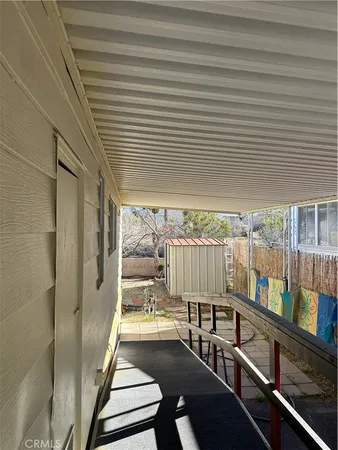 a view of swimming pool with outdoor seating