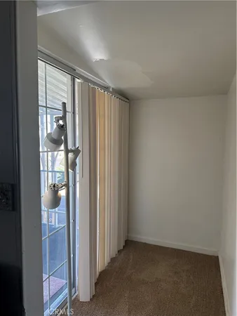 an empty room and windows