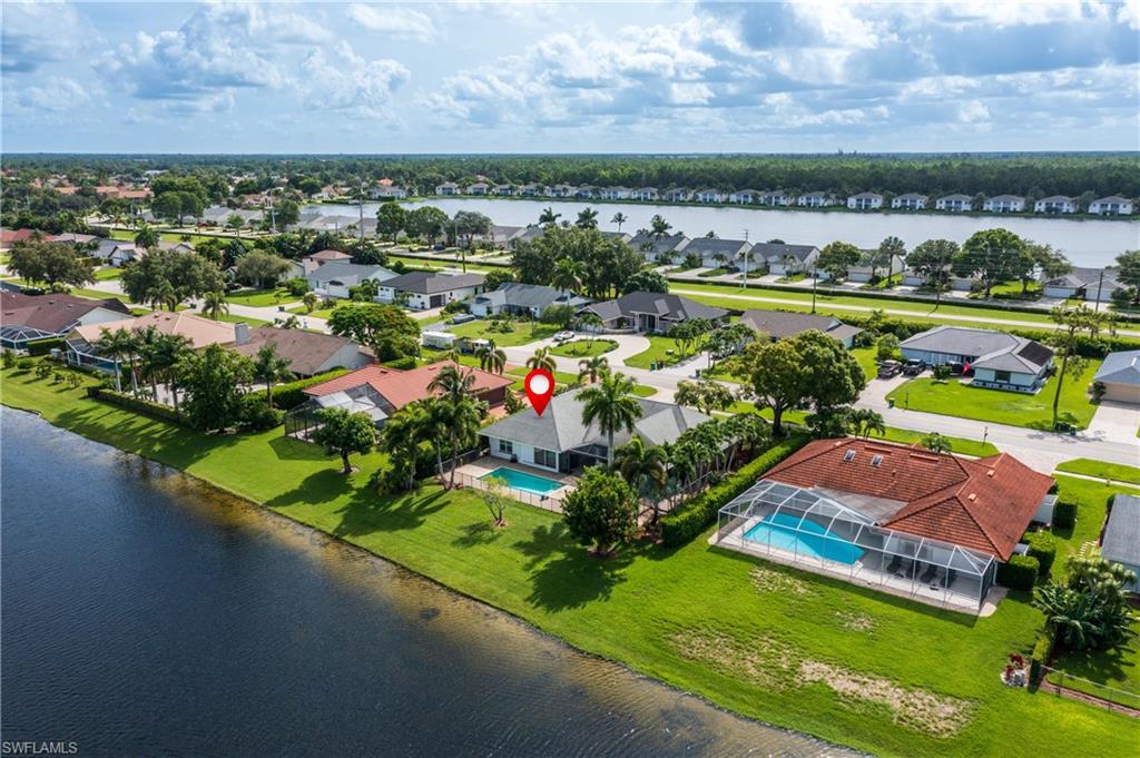 2500 Kings Lake Boulevard Naples, FL 34112 - Photo 30 of 31 a view of a city with a lake view