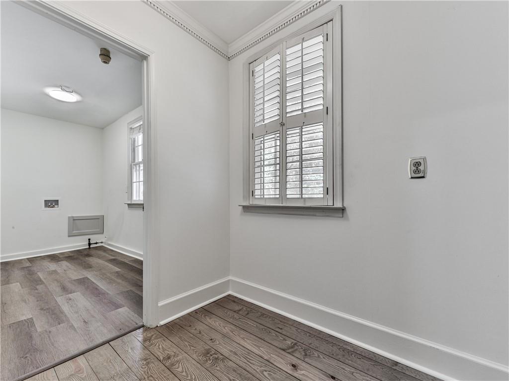 633 Butterworth Road Canton, GA 30114 - Photo 37 of 55 an empty room with wooden floor and windows