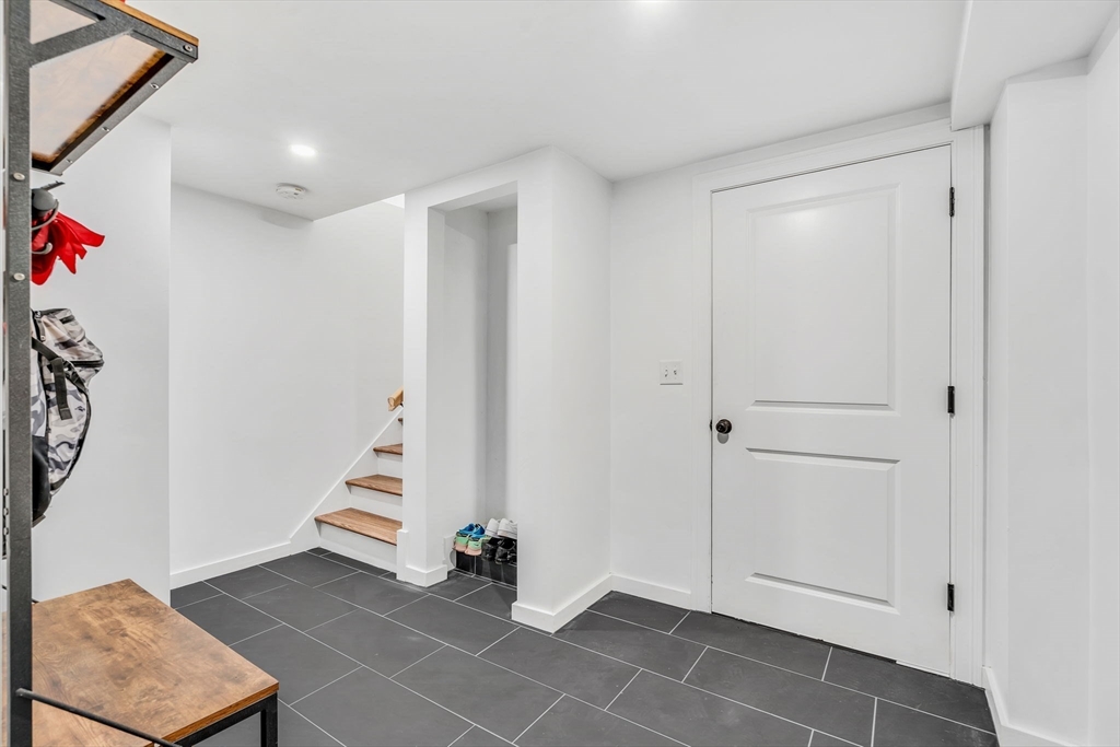 137 Harvard Road Stow, MA 01775 - Photo 14 of 18 a view of an entryway with stairs