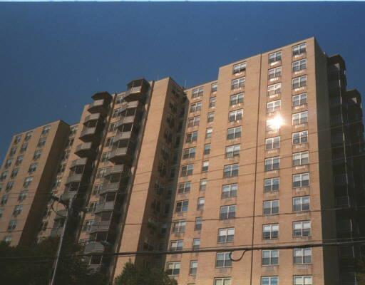 50 Glenbrook Road, Unit 8J Stamford, CT 06902 - Photo 1 of 1 a view of a large building