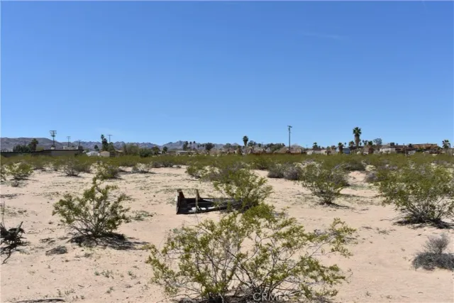 a view of a ocean with a beach