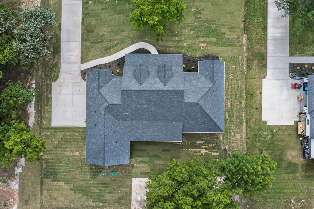 9080 County Road 669 Blue Ridge, TX 75424 - Photo 4 of 40 an aerial view of a house with a yard
