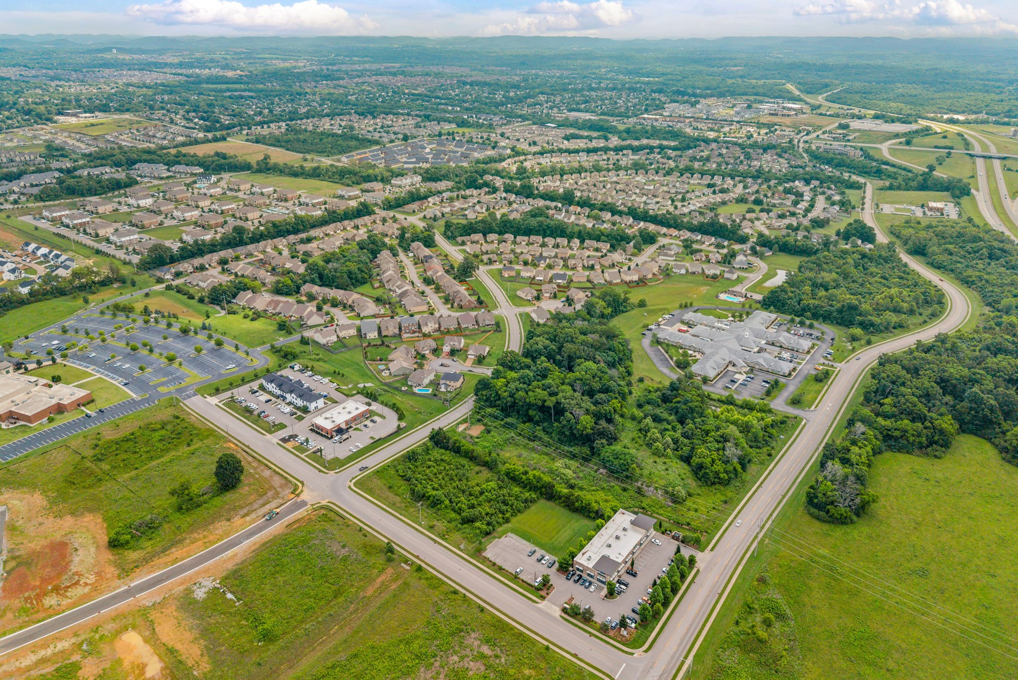 1161 Cynthia Lane Spring Hill, TN 37174 - Photo 41 of 42 an aerial view of residential houses with outdoor space