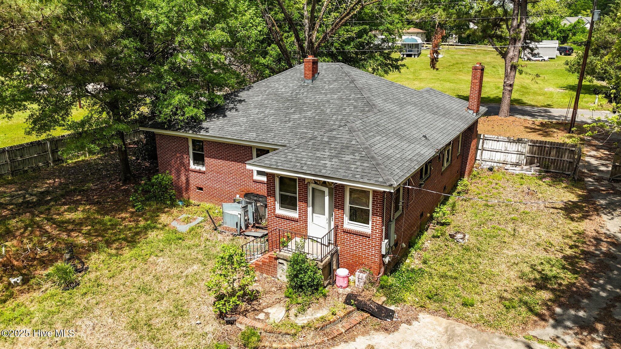 904 Liberty Hill Road Kinston, NC 28501 - Photo 39 of 53 Rear of house with circular steps and patio