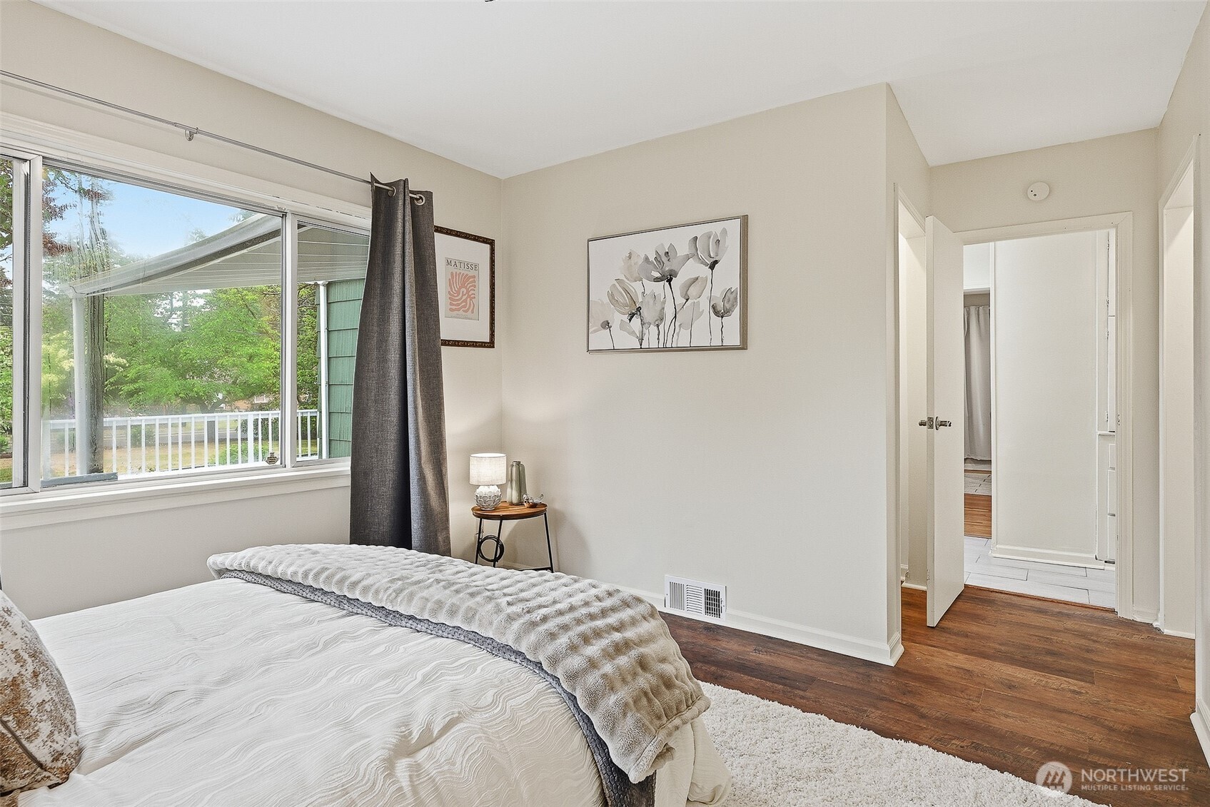 17633 10th Avenue Northeast Shoreline, WA 98155 - Photo 17 of 33 a bedroom with a bed and a window