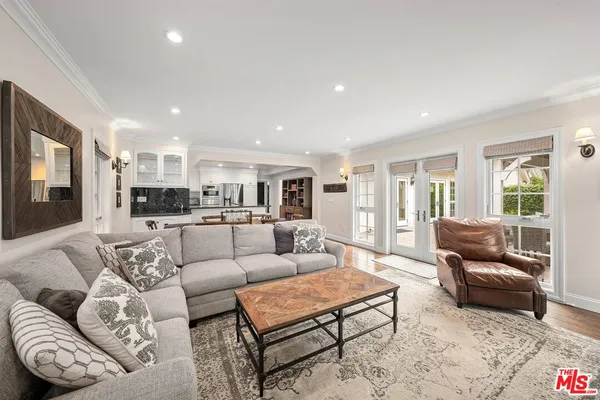 a living room with furniture and a couch