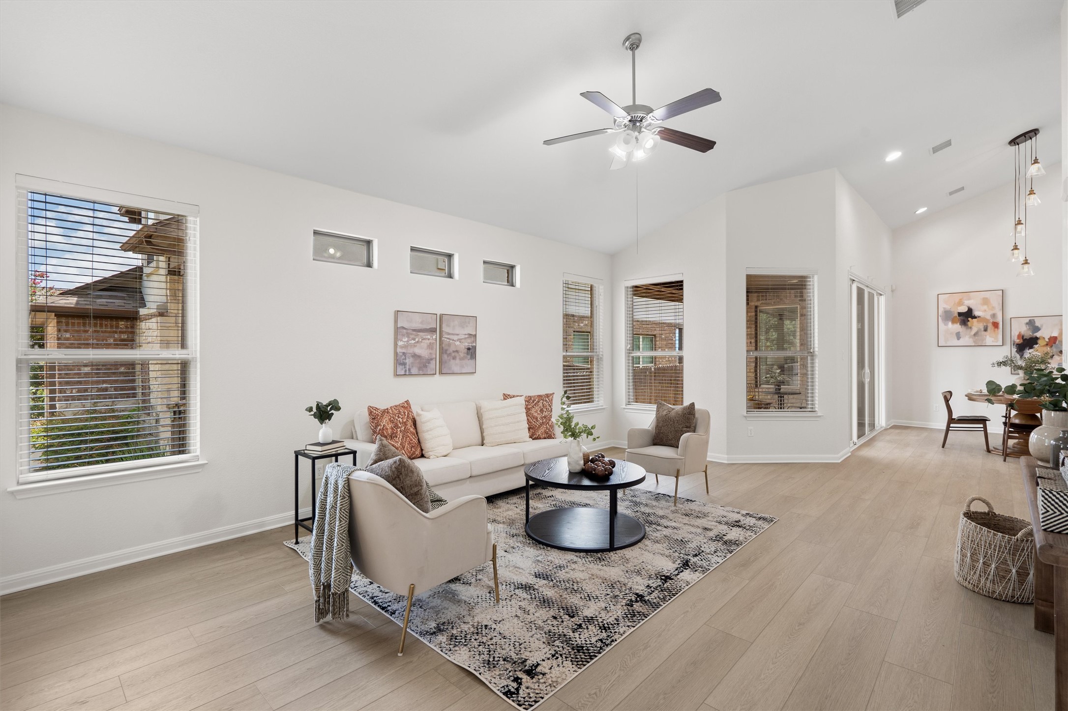 1128 Clearwing Circle Georgetown, TX 78626 - Photo 7 of 38 Vaulted ceilings in the living room make it feel spacious and bright.