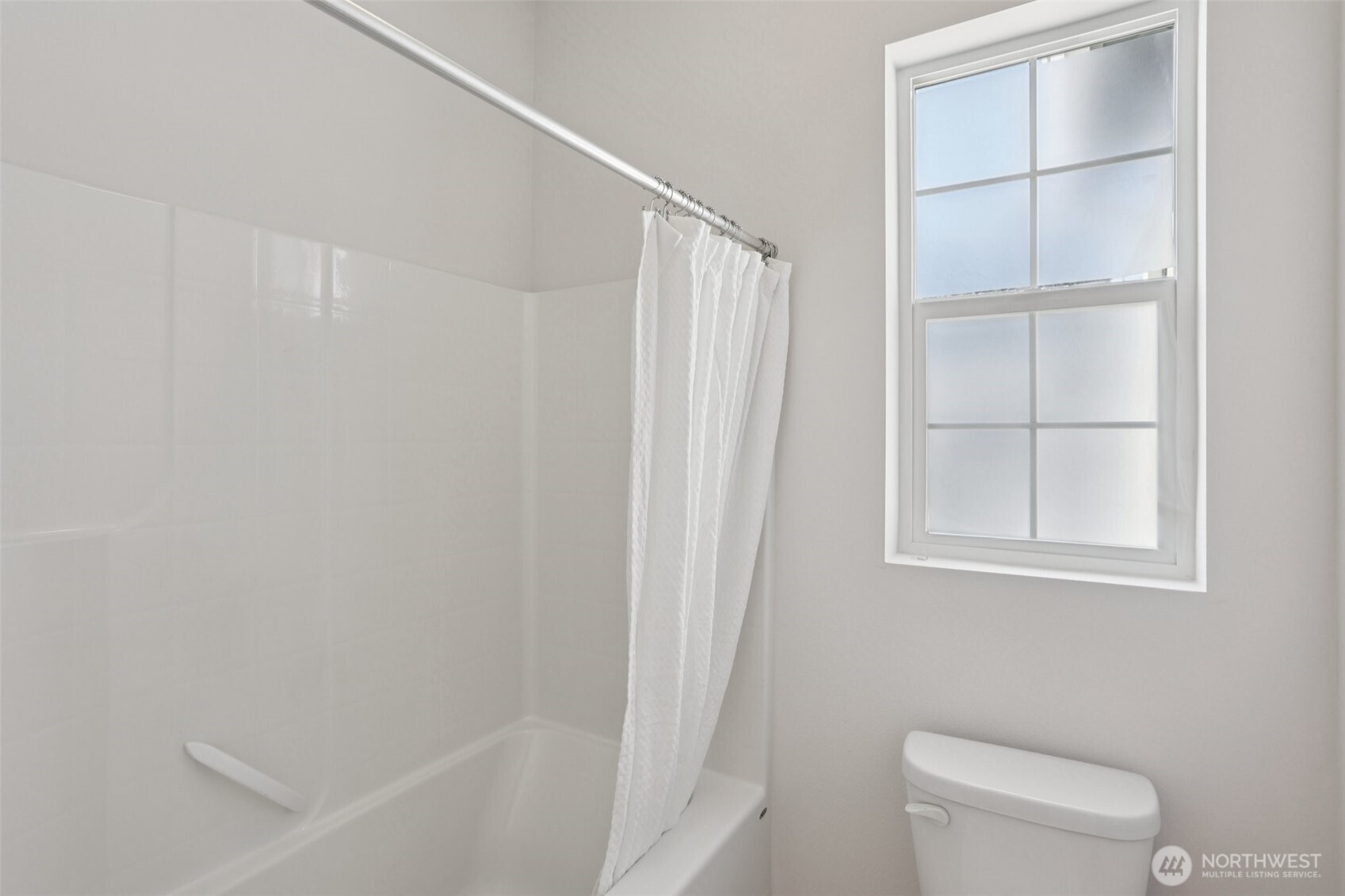 19817 35th Drive Southeast Bothell, WA 98012 - Photo 13 of 34 a bathroom with a toilet and a shower