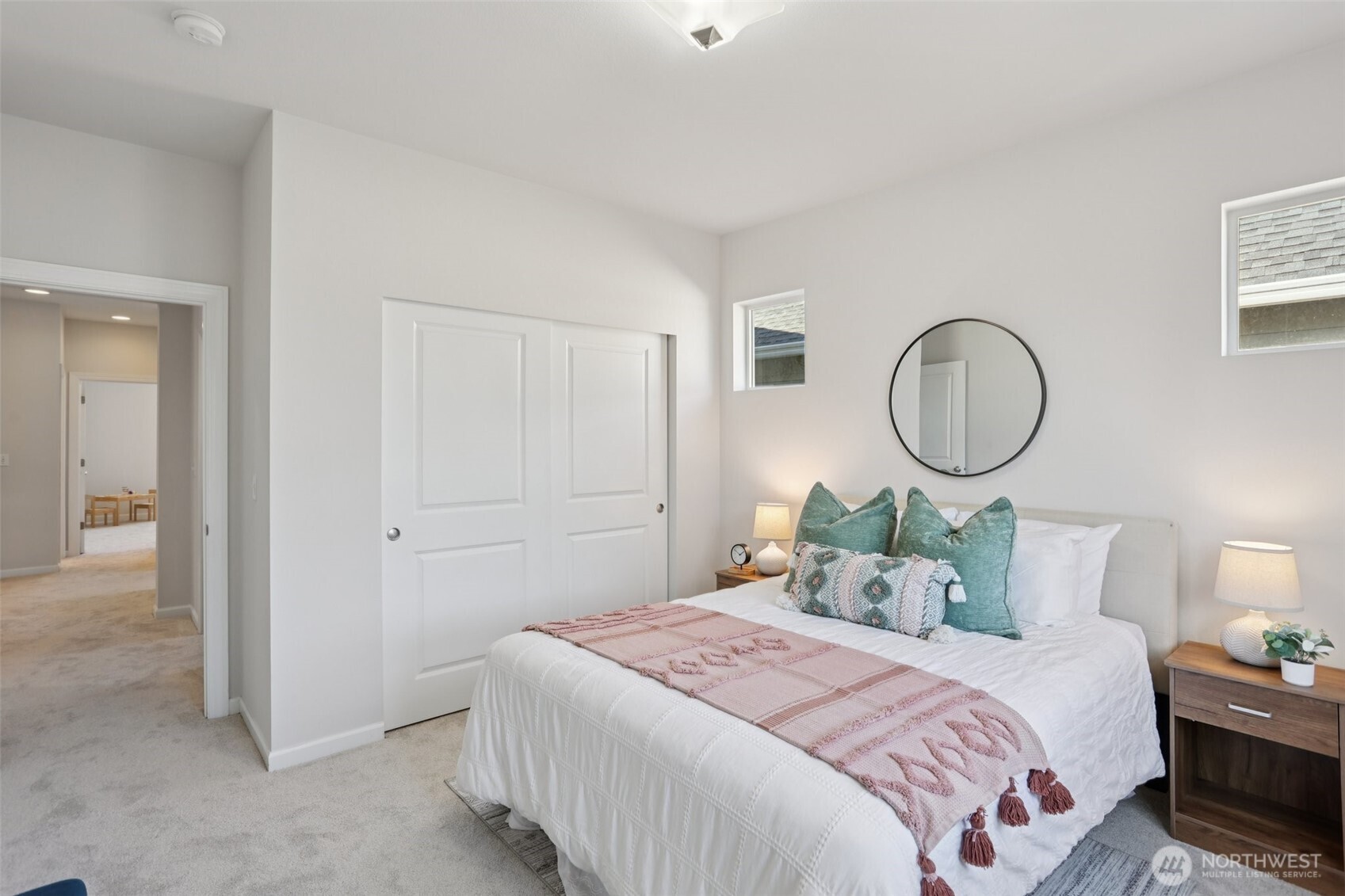 19817 35th Drive Southeast Bothell, WA 98012 - Photo 18 of 34 a bedroom with bed and a mirror