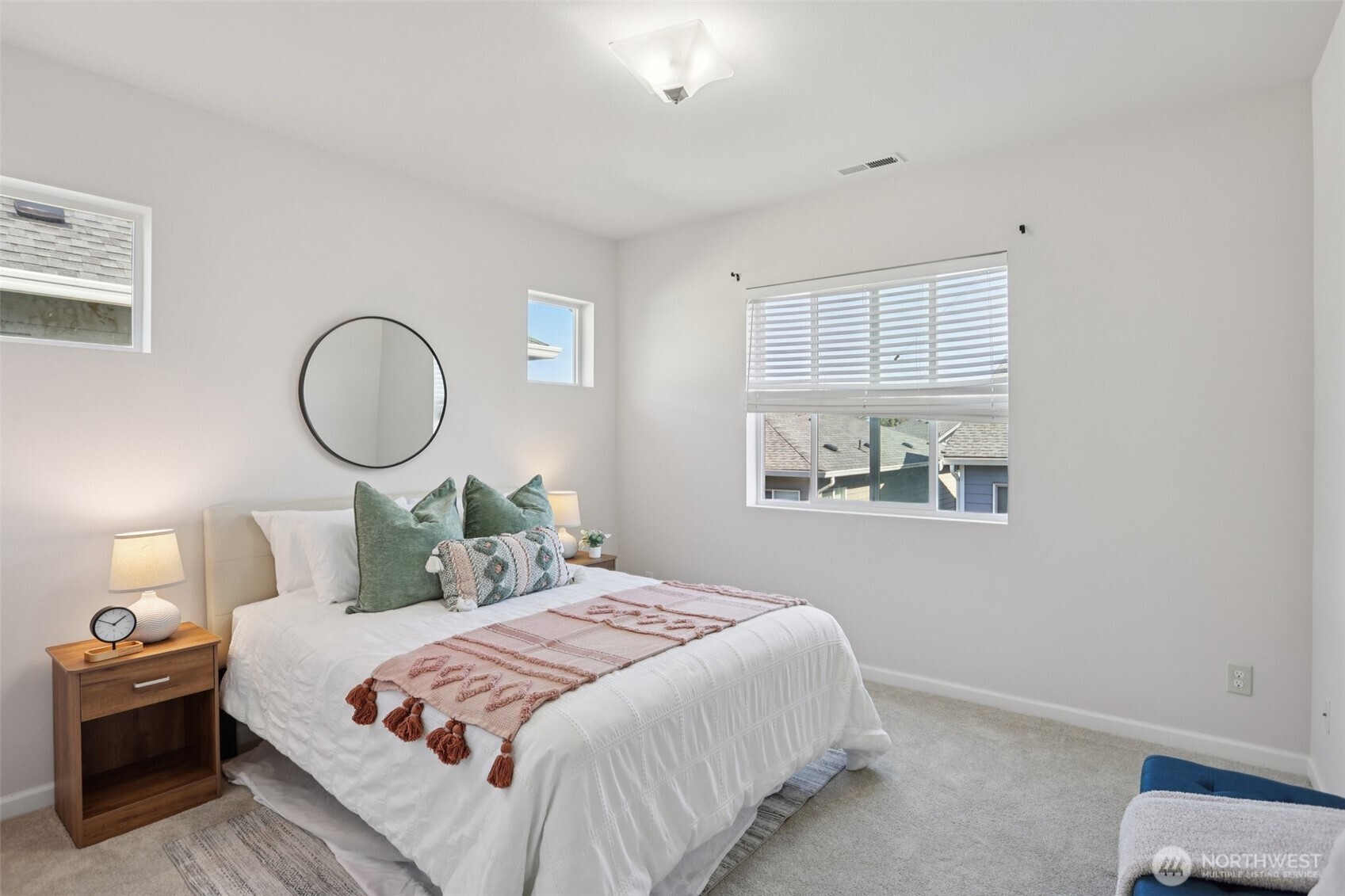 19817 35th Drive Southeast Bothell, WA 98012 - Photo 19 of 34 a bedroom with a bed and a painting on the wall