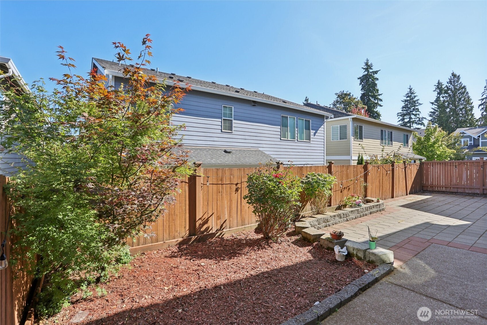 19817 35th Drive Southeast Bothell, WA 98012 - Photo 28 of 34 a front view of a house with garden