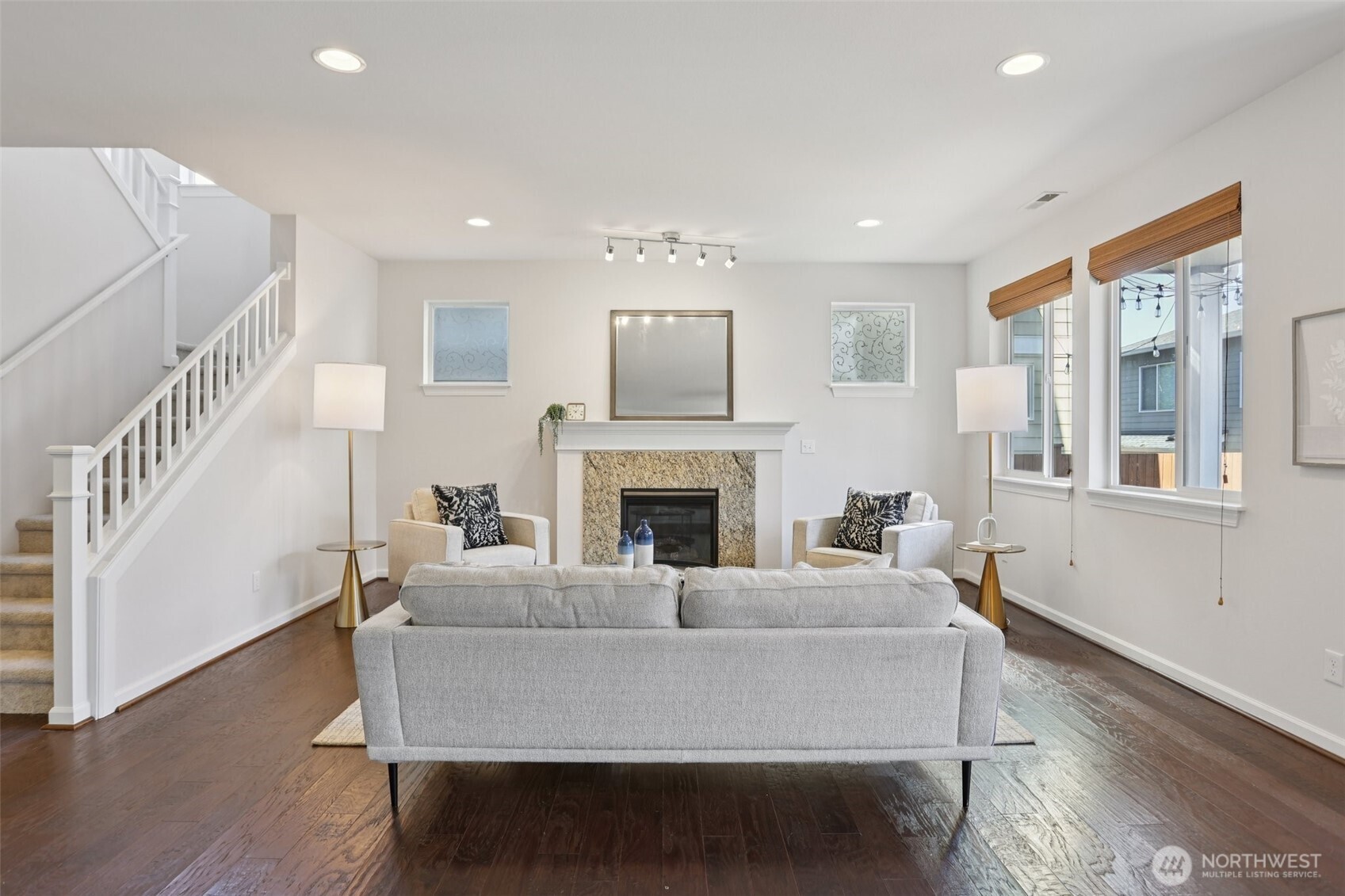 19817 35th Drive Southeast Bothell, WA 98012 - Photo 3 of 34 a living room with furniture and a fireplace