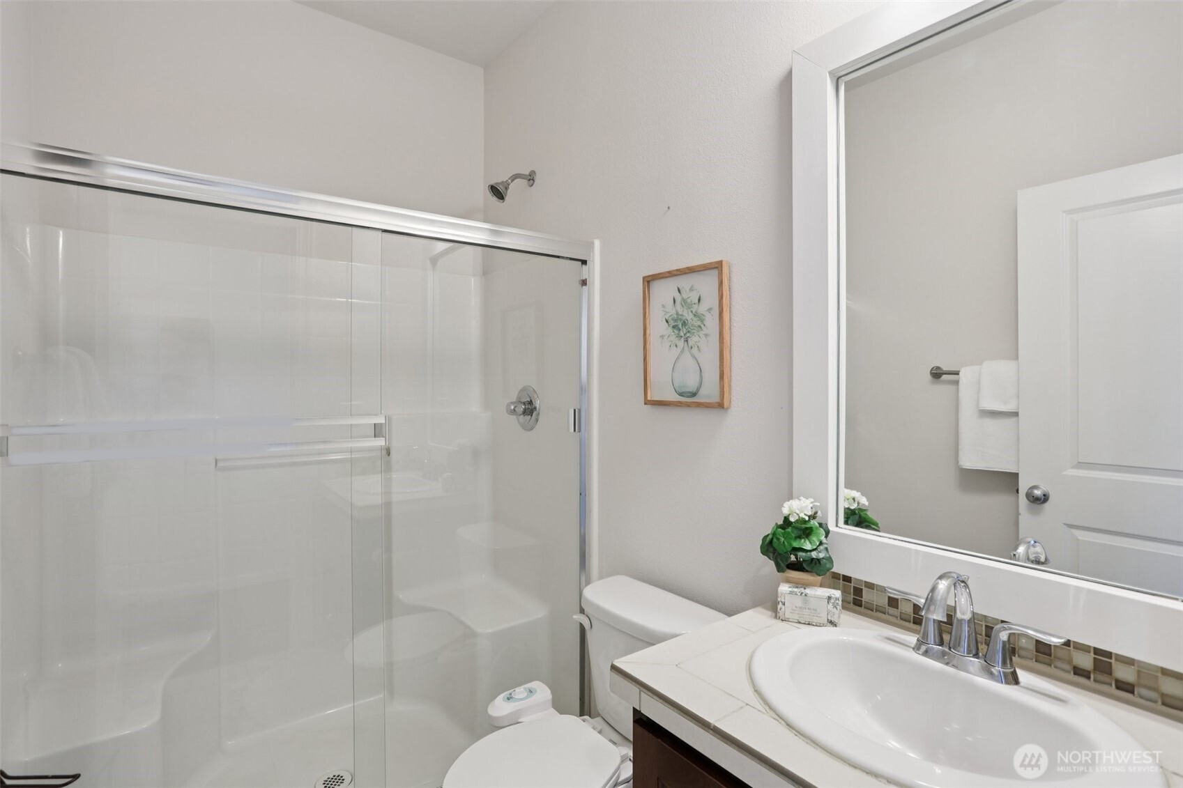 19817 35th Drive Southeast Bothell, WA 98012 - Photo 8 of 34 a bathroom with a sink toilet and shower