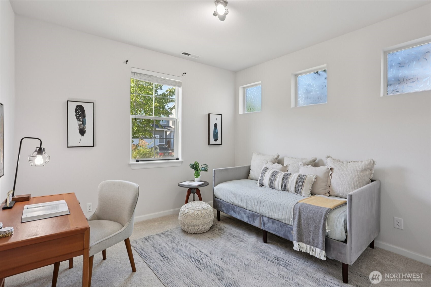19817 35th Drive Southeast Bothell, WA 98012 - Photo 9 of 34 a living room with furniture and a window