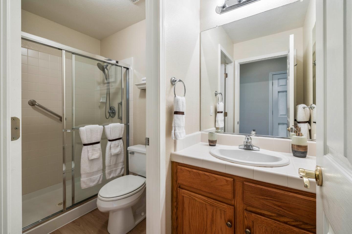 2016 Carignan Way San Jose, CA 95135 - Photo 19 of 44 a bathroom with a sink toilet and shower