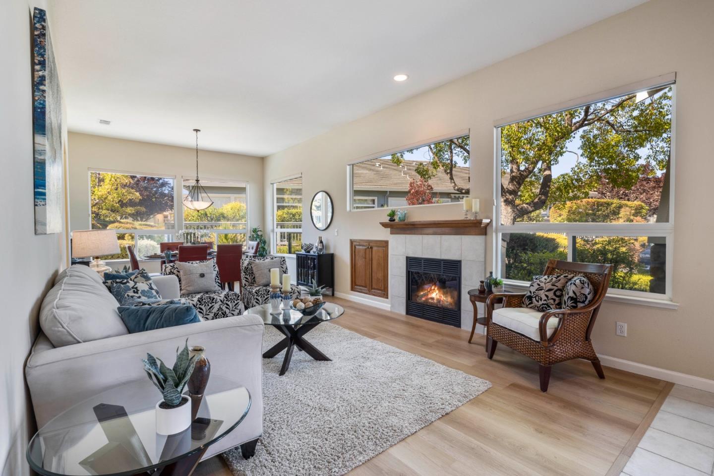 2016 Carignan Way San Jose, CA 95135 - Photo 7 of 44 a living room with furniture fireplace and large windows