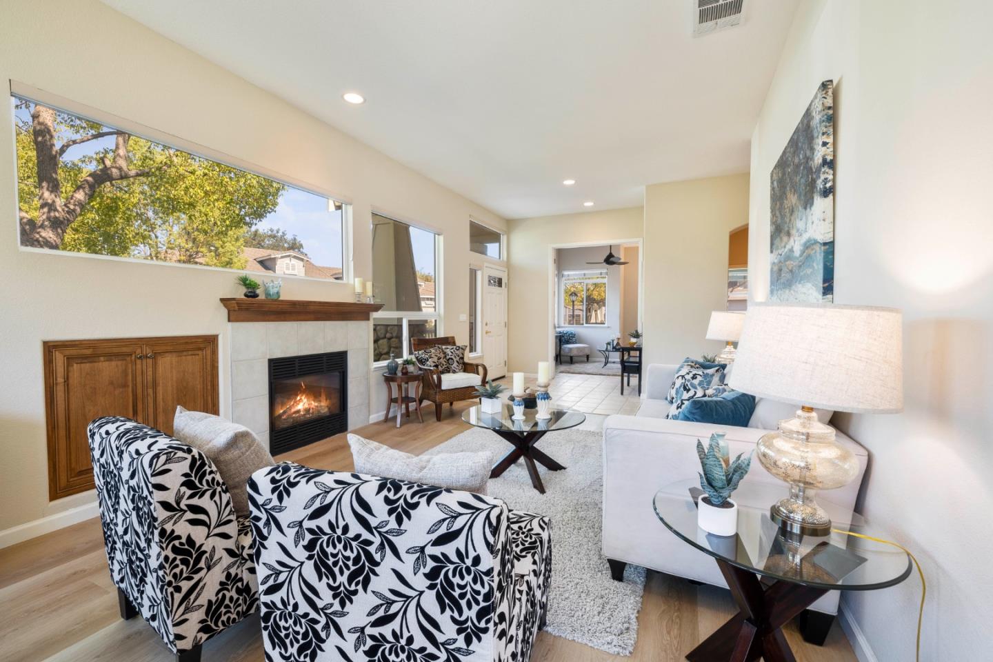 2016 Carignan Way San Jose, CA 95135 - Photo 8 of 44 a living room with furniture a fireplace and a table