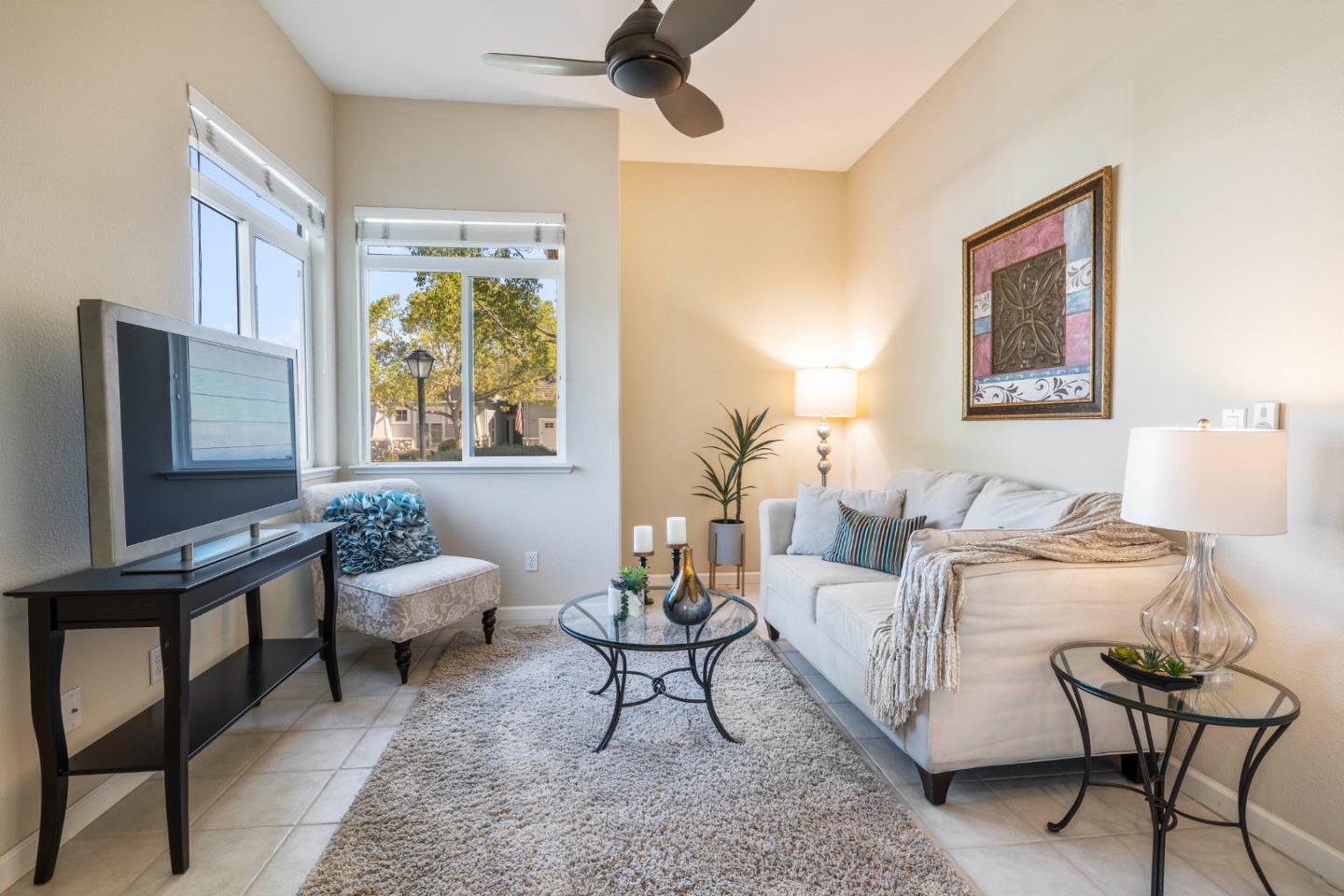 2016 Carignan Way San Jose, CA 95135 - Photo 10 of 44 a living room with furniture and a flat screen tv