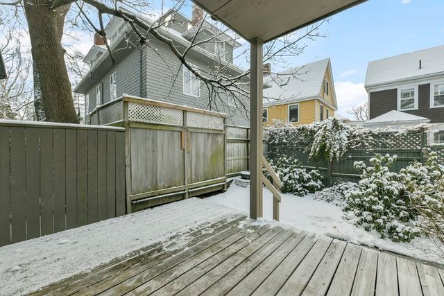 a view of a backyard of the house
