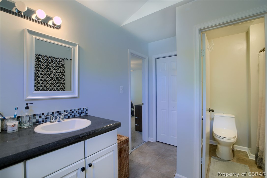 133 Springdale Way Hampton, VA 23666 - Photo 17 of 25 Bathroom with tile patterned flooring, toilet, and vanity