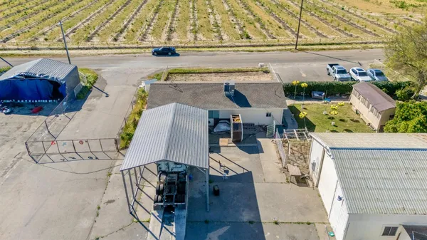 a picture of a table and chairs in a patio
