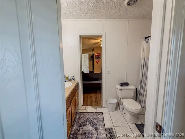 a workspace with furniture and mirror