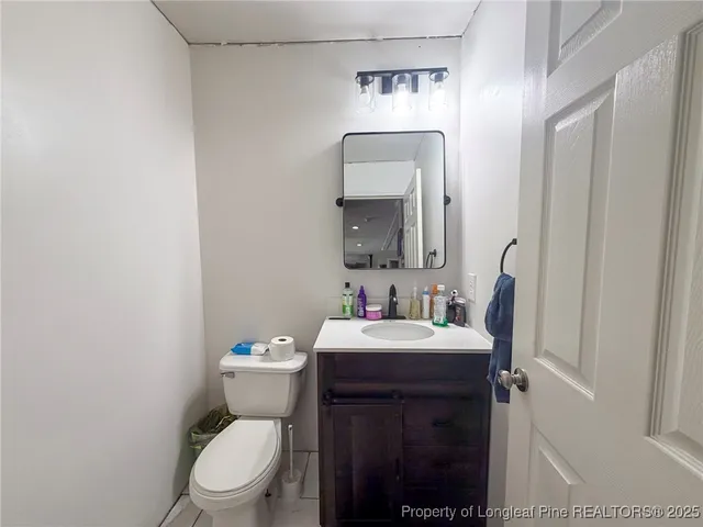 a room with furniture and white walls