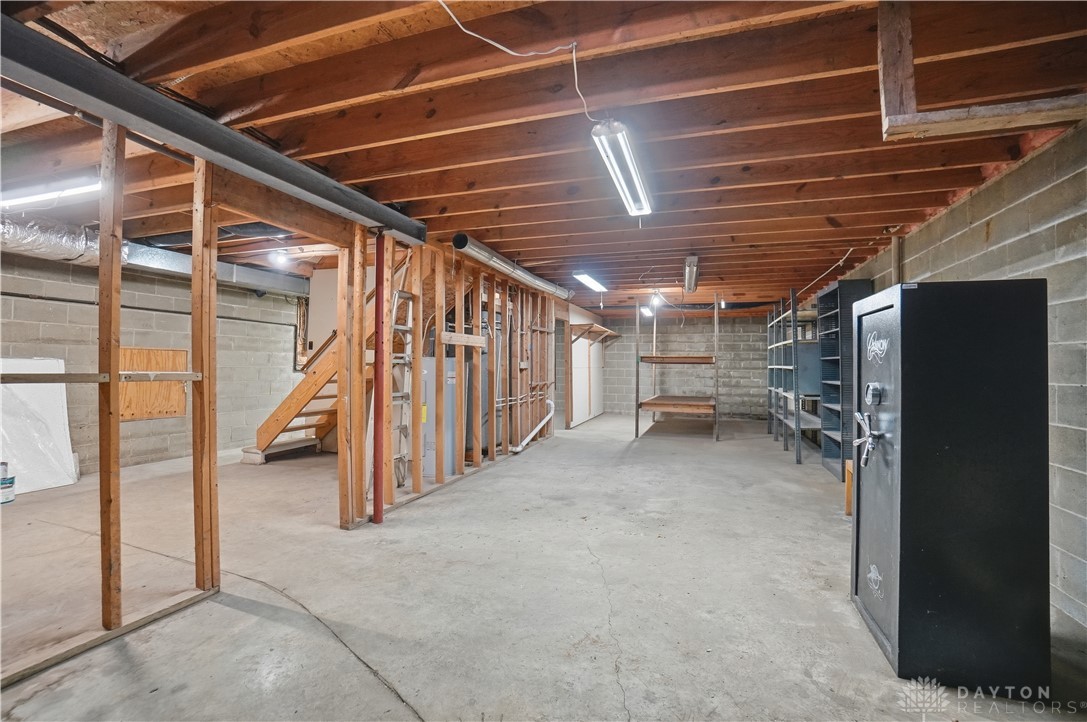 7553 Coffin Station Road Springfield, OH 45502 - Photo 78 of 95 This spacious basement offers ample storage and future potential.