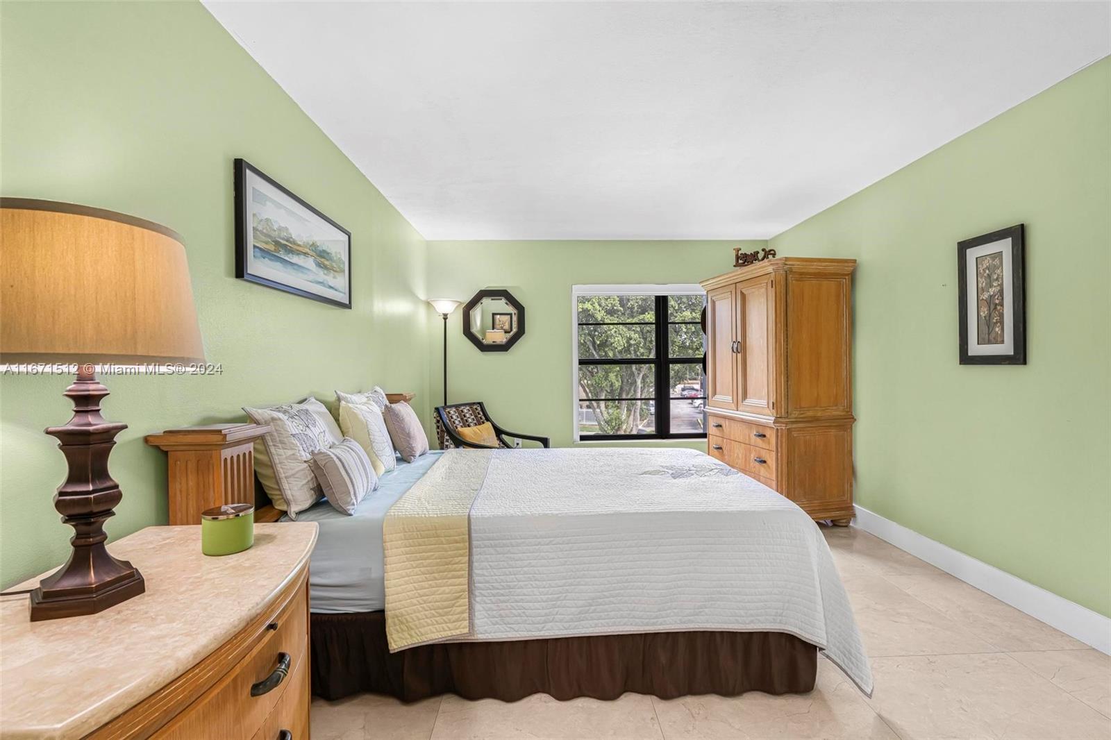 6300 Southwest 138th Court, Unit 307 Miami, FL 33183 - Photo 15 of 30 a bedroom with bed and a window