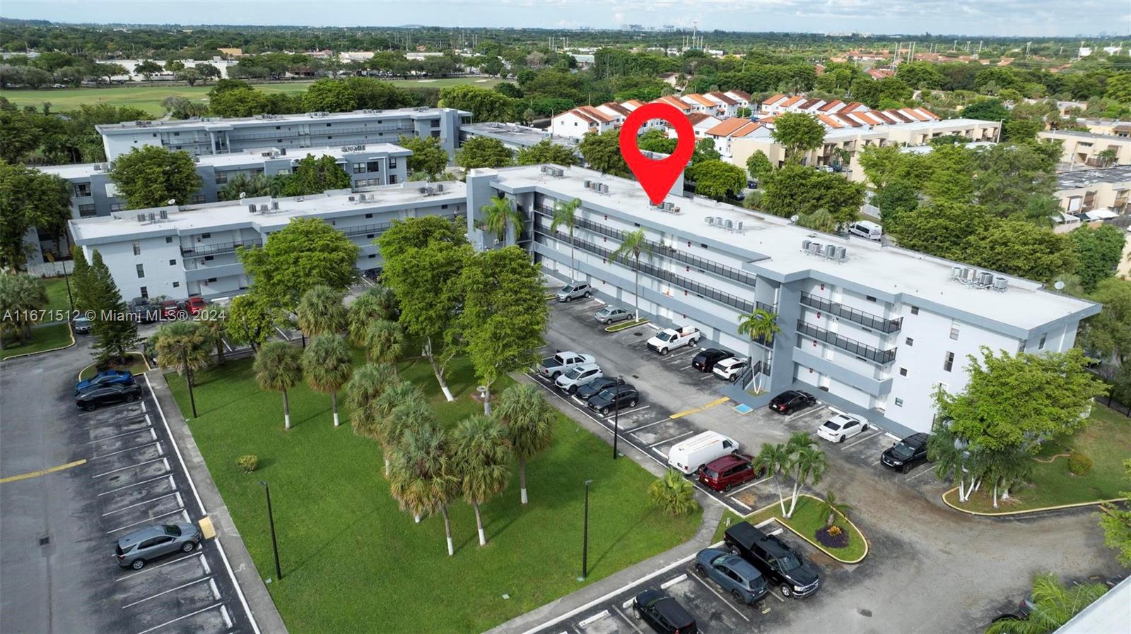 6300 Southwest 138th Court, Unit 307 Miami, FL 33183 - Photo 25 of 30 a view of a lake with a sitting space