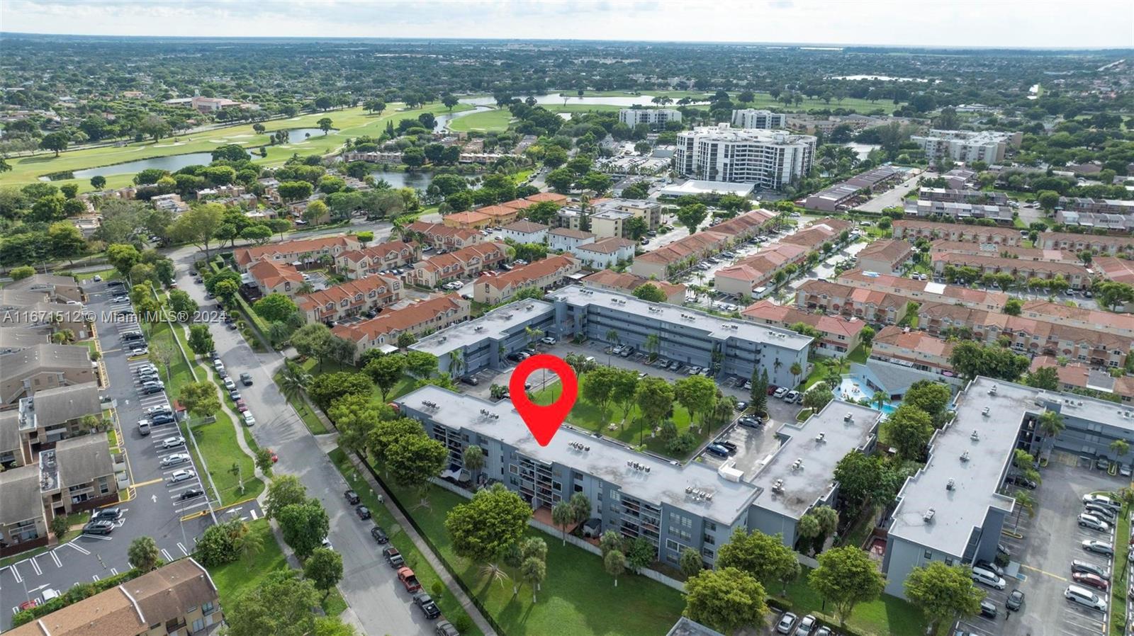 6300 Southwest 138th Court, Unit 307 Miami, FL 33183 - Photo 28 of 30 an aerial view of residential houses with outdoor space