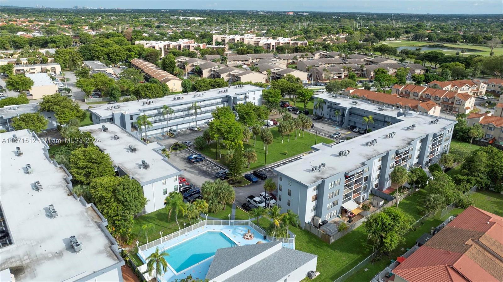 6300 Southwest 138th Court, Unit 307 Miami, FL 33183 - Photo 29 of 30 an aerial view of house with yard