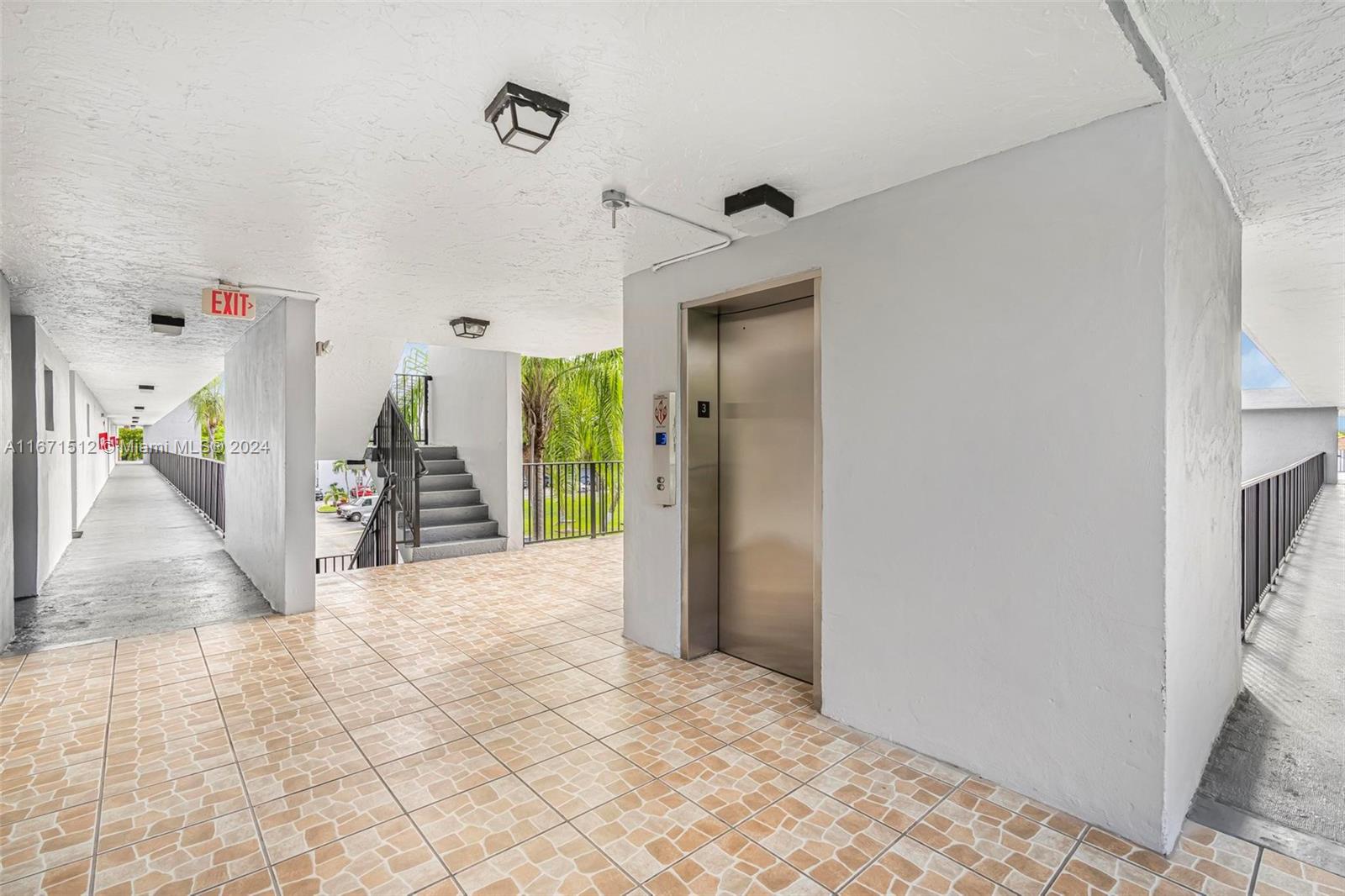 6300 Southwest 138th Court, Unit 307 Miami, FL 33183 - Photo 3 of 30 a view of a hallway view of a living room