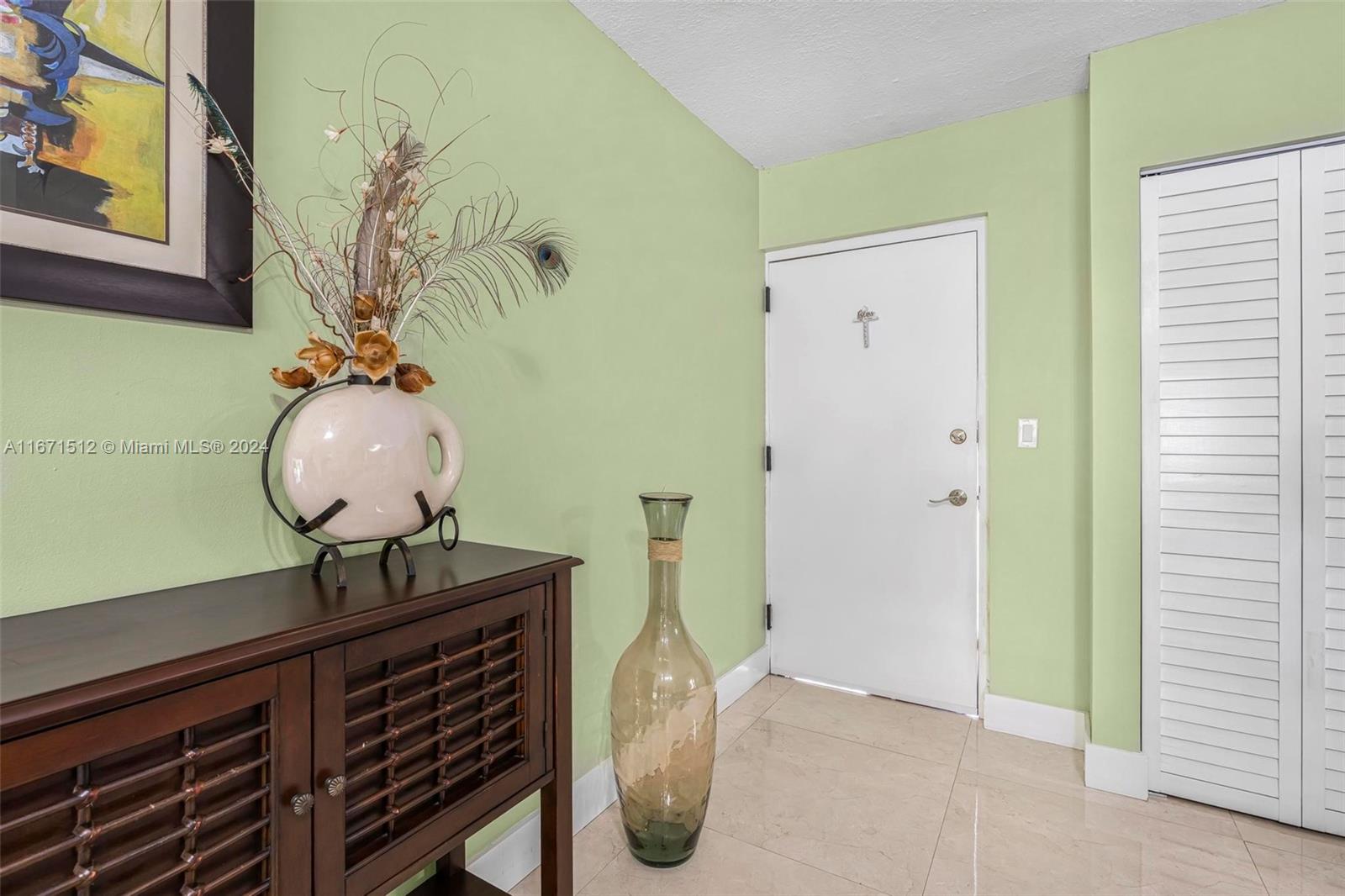 6300 Southwest 138th Court, Unit 307 Miami, FL 33183 - Photo 5 of 30 a vase of flowers sitting on a table