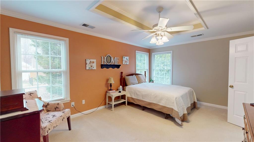 24 Austin Way Jefferson, GA 30549 - Photo 15 of 31 a bedroom with a bed and a window