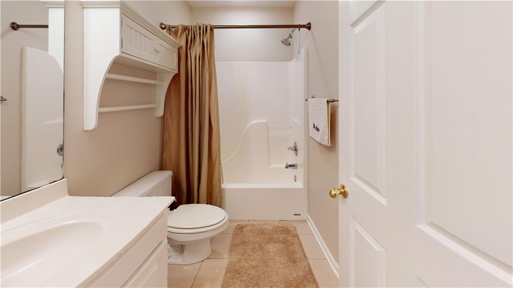 24 Austin Way Jefferson, GA 30549 - Photo 22 of 31 a bathroom with a toilet and a shower