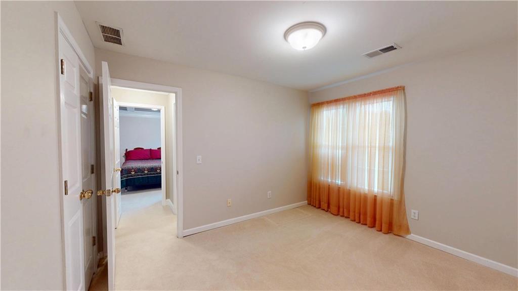 24 Austin Way Jefferson, GA 30549 - Photo 23 of 31 a view of a livingroom with a hallway