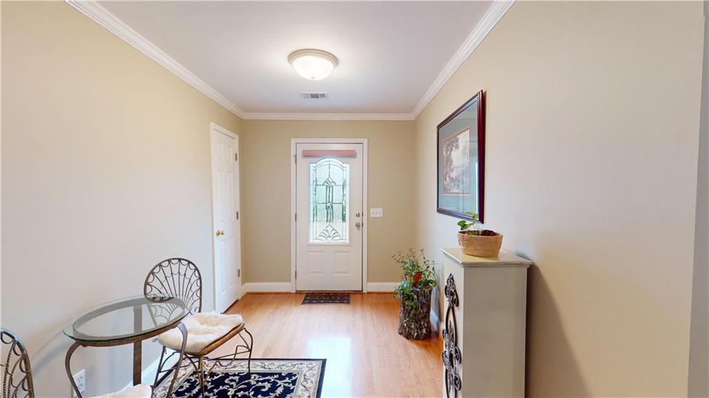 24 Austin Way Jefferson, GA 30549 - Photo 4 of 31 a bedroom with furniture and a window