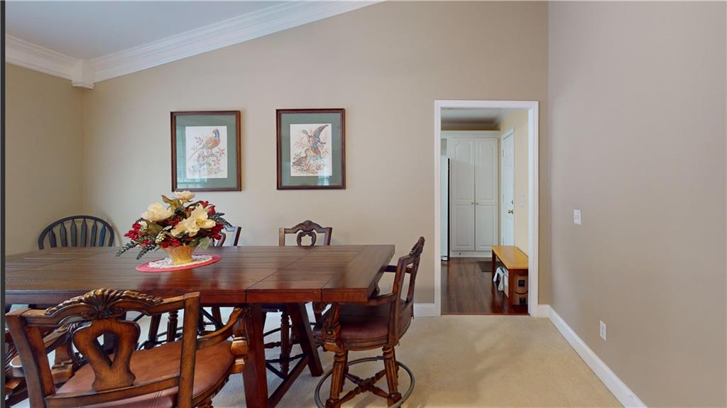 24 Austin Way Jefferson, GA 30549 - Photo 7 of 31 a view of a dining room with furniture and wooden floor