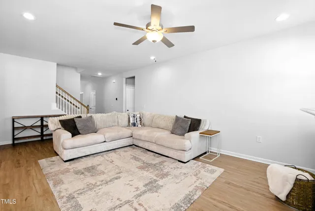 a living room with couches and a coffee table