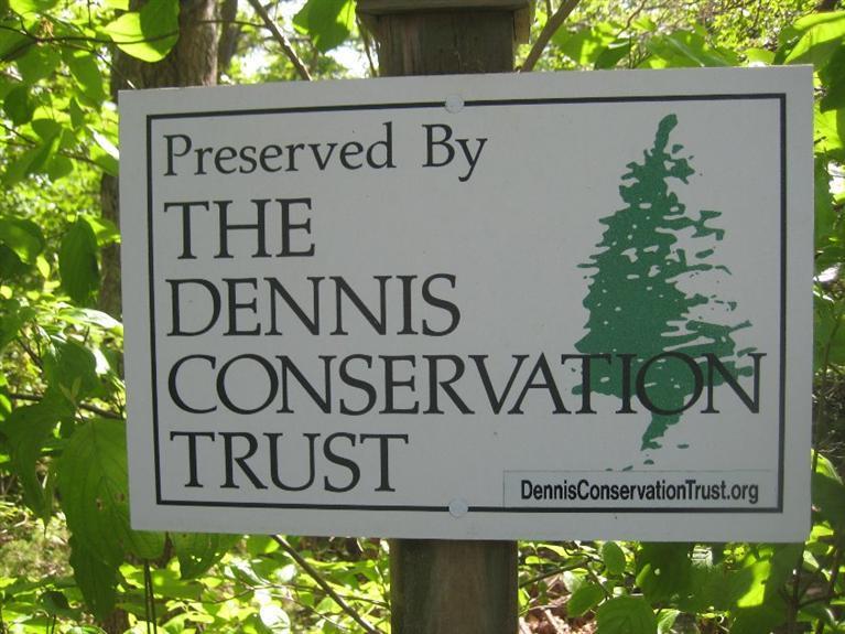129 Cedar Hill Road East Dennis, MA 02660 - Photo 20 of 24 a sign on the side of a building