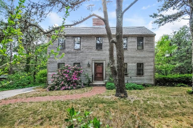129 Cedar Hill Road East Dennis, MA 02660 - Photo 2 of 24 a front view of a house with yard