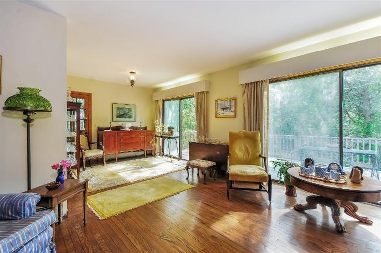 129 Cedar Hill Road East Dennis, MA 02660 - Photo 6 of 24 a living room with furniture and a wooden floor
