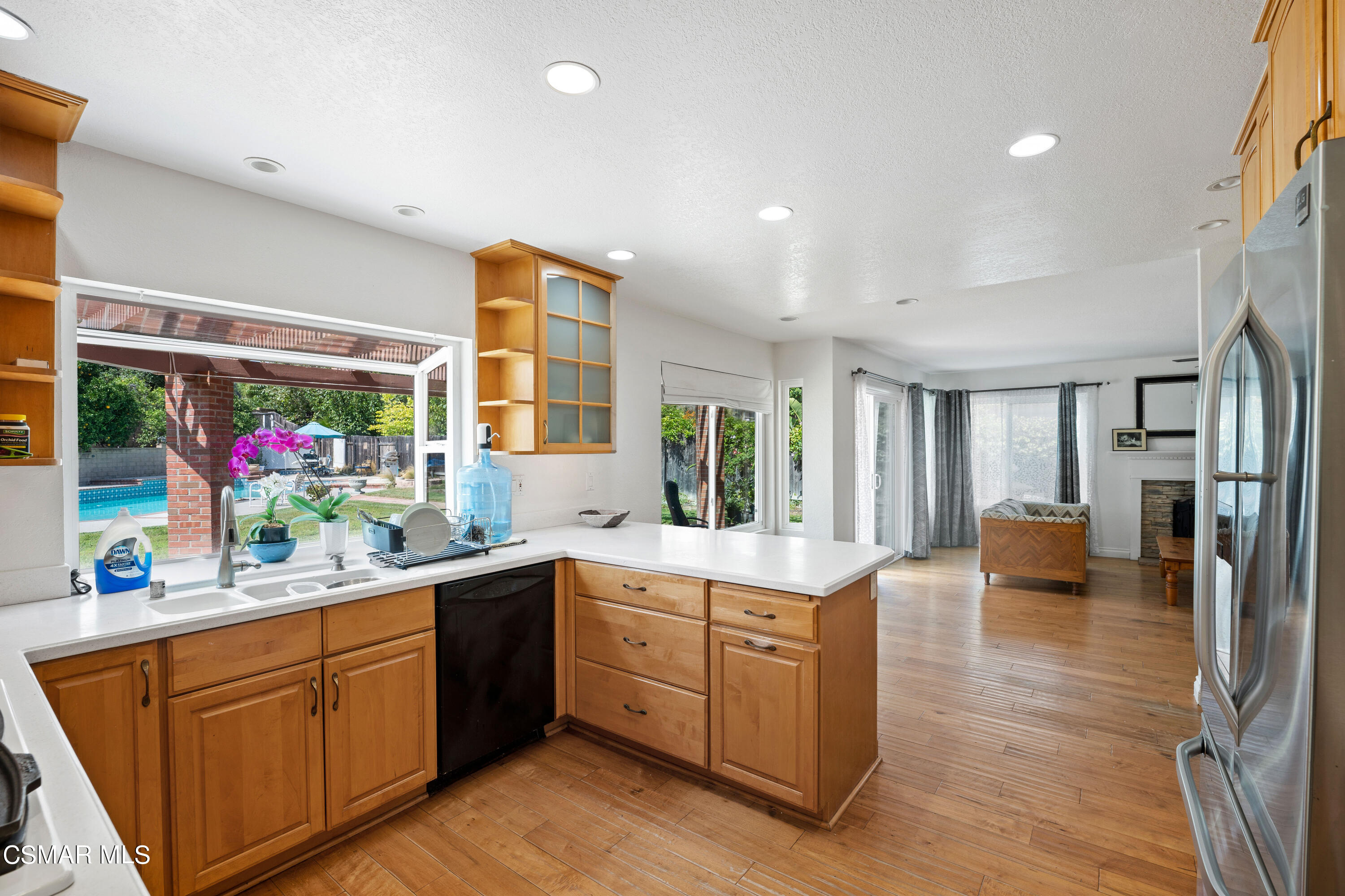 2835 Corte Caballos Camarillo, CA 93010 - Photo 15 of 35 a kitchen with a sink stove and cabinets