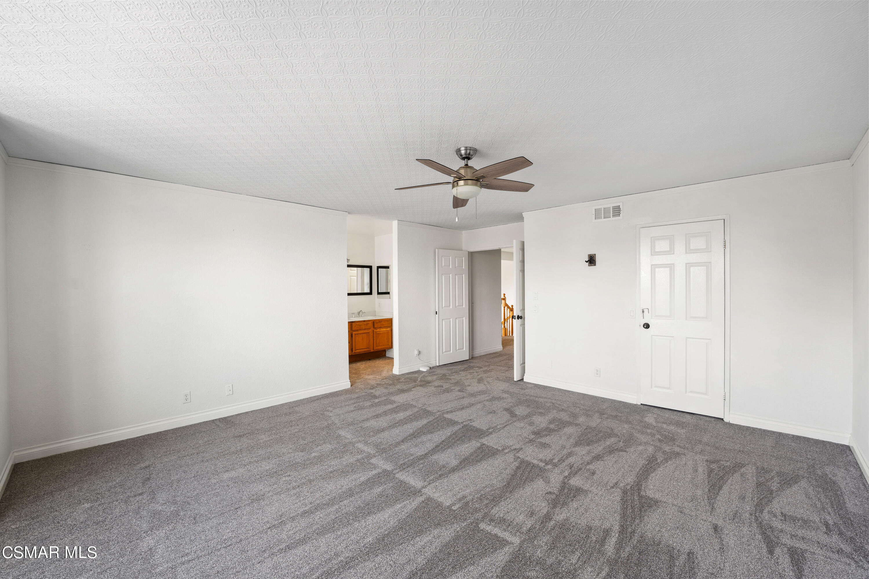 2835 Corte Caballos Camarillo, CA 93010 - Photo 19 of 35 a view of a livingroom with a ceiling fan and window