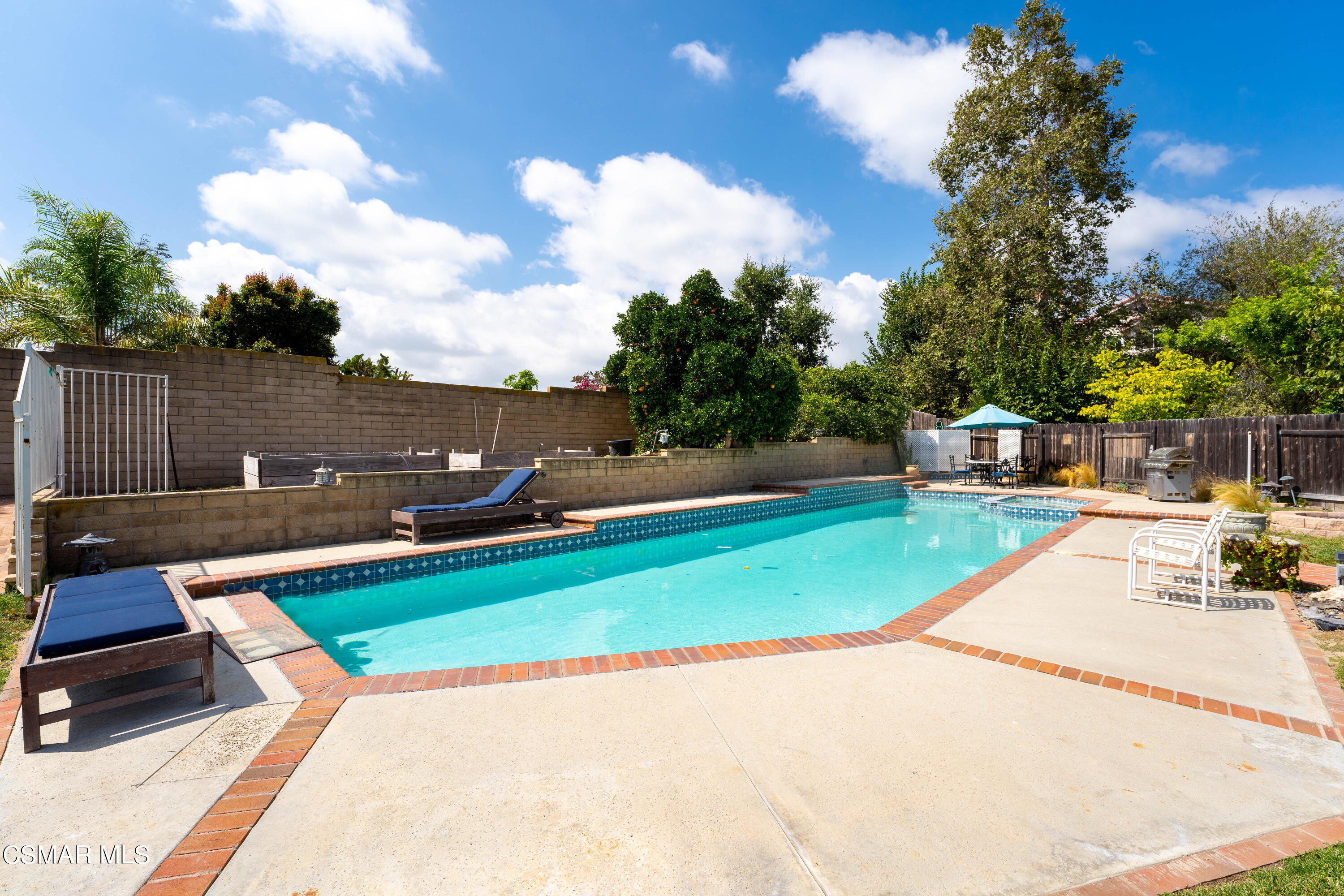 2835 Corte Caballos Camarillo, CA 93010 - Photo 27 of 35 a view of a swimming pool with a patio