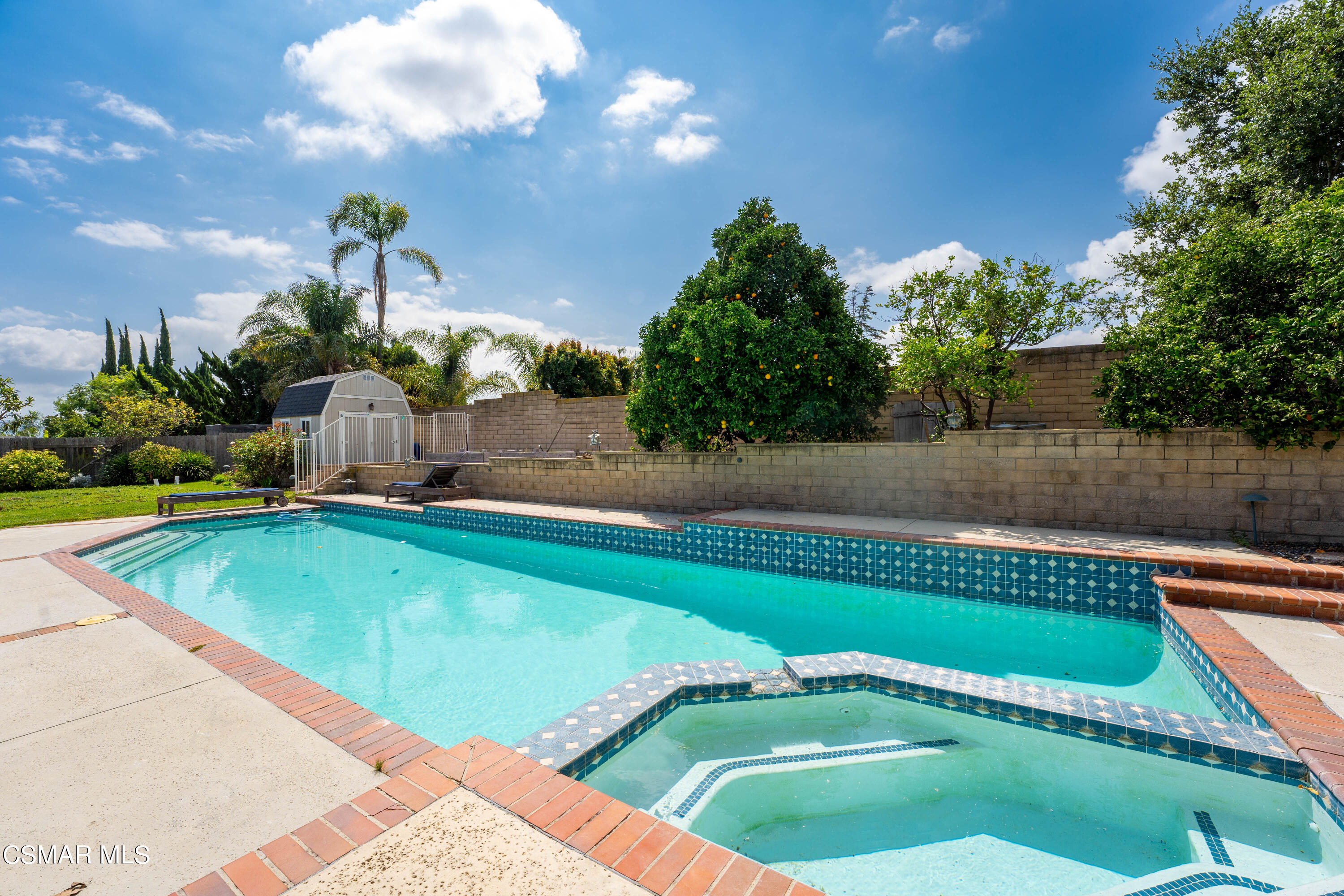 2835 Corte Caballos Camarillo, CA 93010 - Photo 28 of 35 a view of a swimming pool and a yard